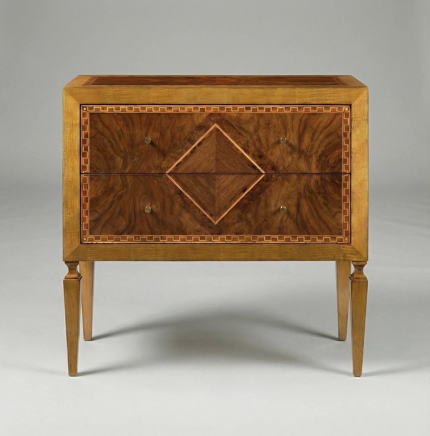 Front view of Italian Louis XVI nightstand, two drawers visible.