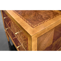 Close-up of nightstand inlay and wood details.