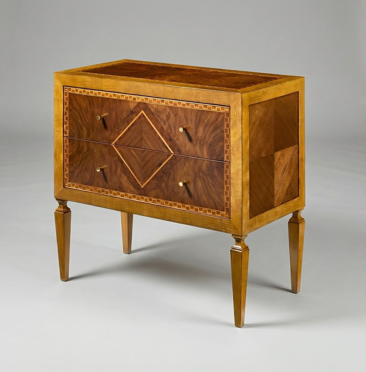 Italian nightstand side view showing inlaid wood design.