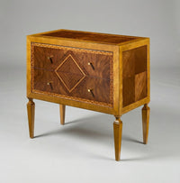 Italian nightstand side view showing inlaid wood design.