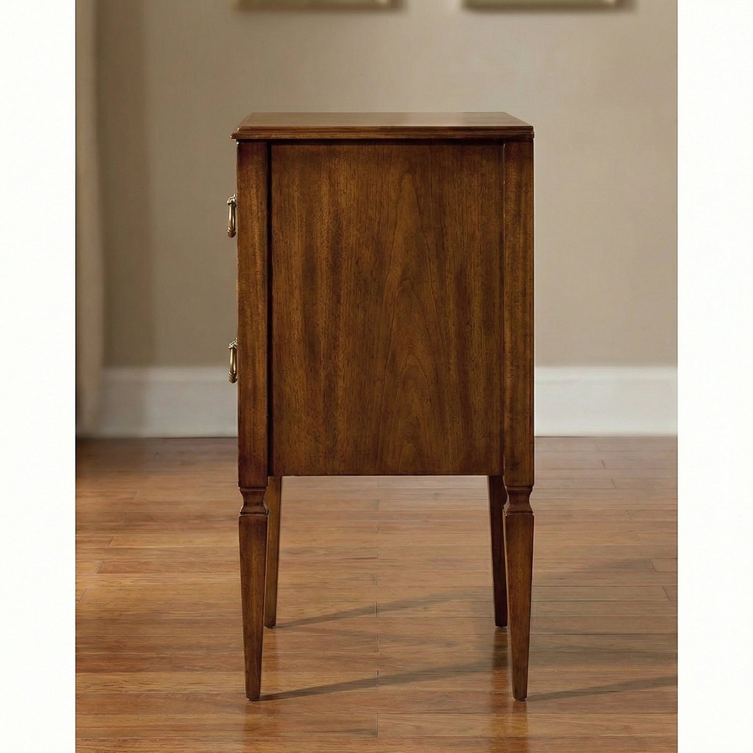 Italian walnut bedside chest side view.