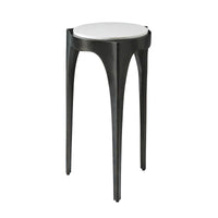 Modernist accent table side view with three legs.