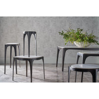 Set of Italian modernist side tables in room setting.