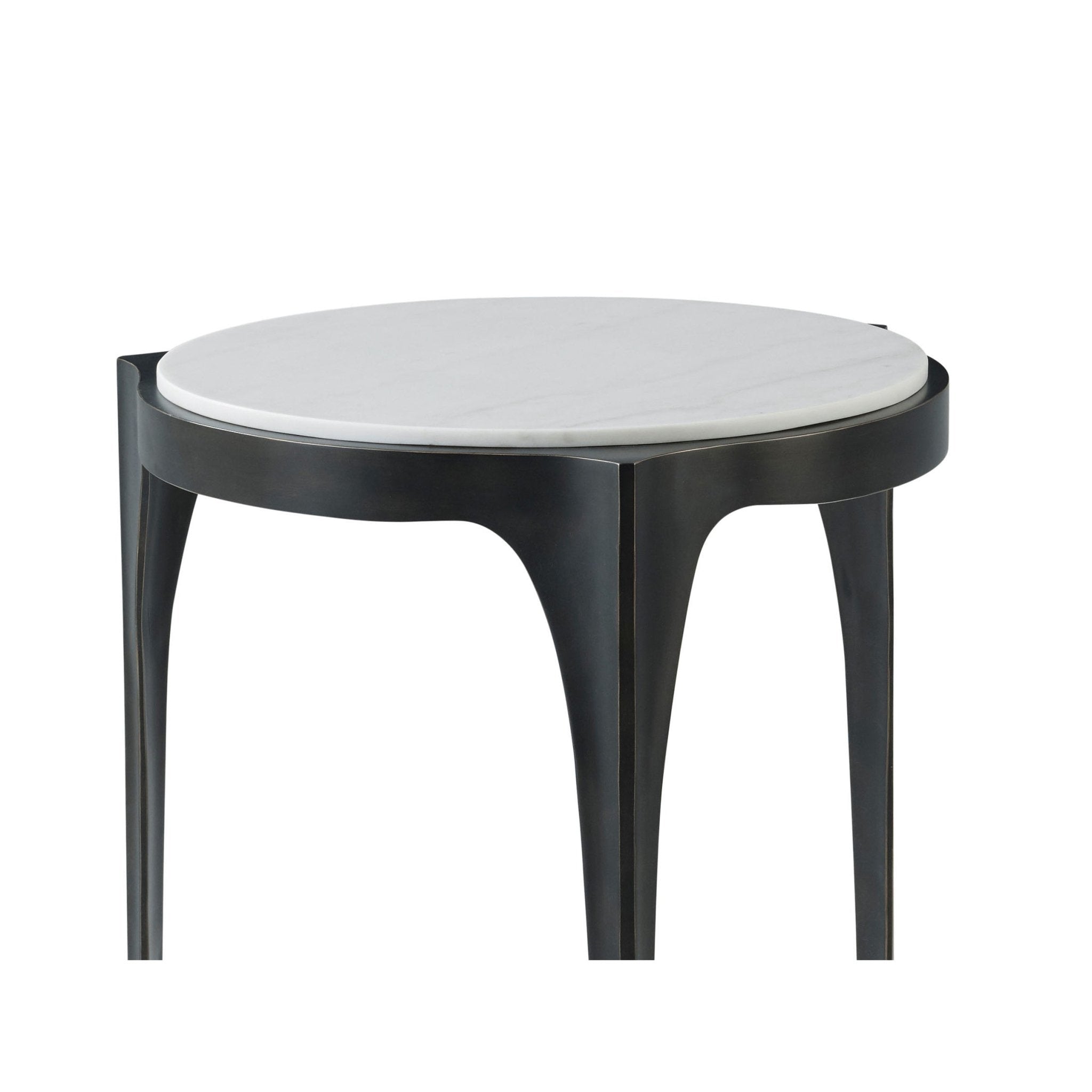 Close-up of round side table, marble top detail.