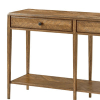 Close-up of oak console table drawer design.