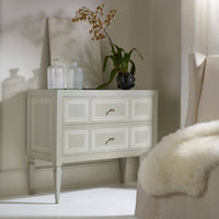 Decorated Italian Neo Classic commode with plants and ornaments.