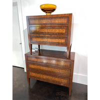 Stacked Italian Neo Classic three-drawer commodes with decor.