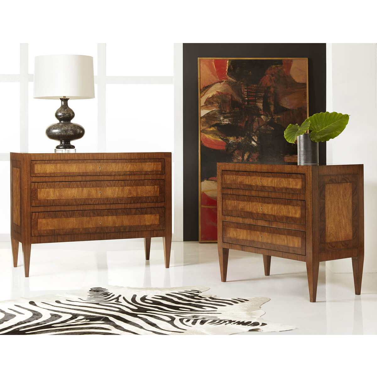 Two commodes styled in modern interior with rug.