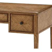 Oak desk drawer close-up with natural wood texture.
