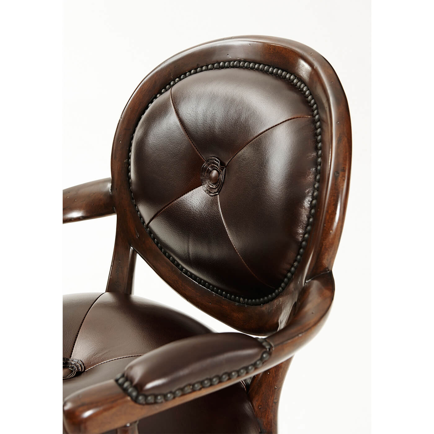 Italian NeoClassic bar stool close-up of tufted backrest.