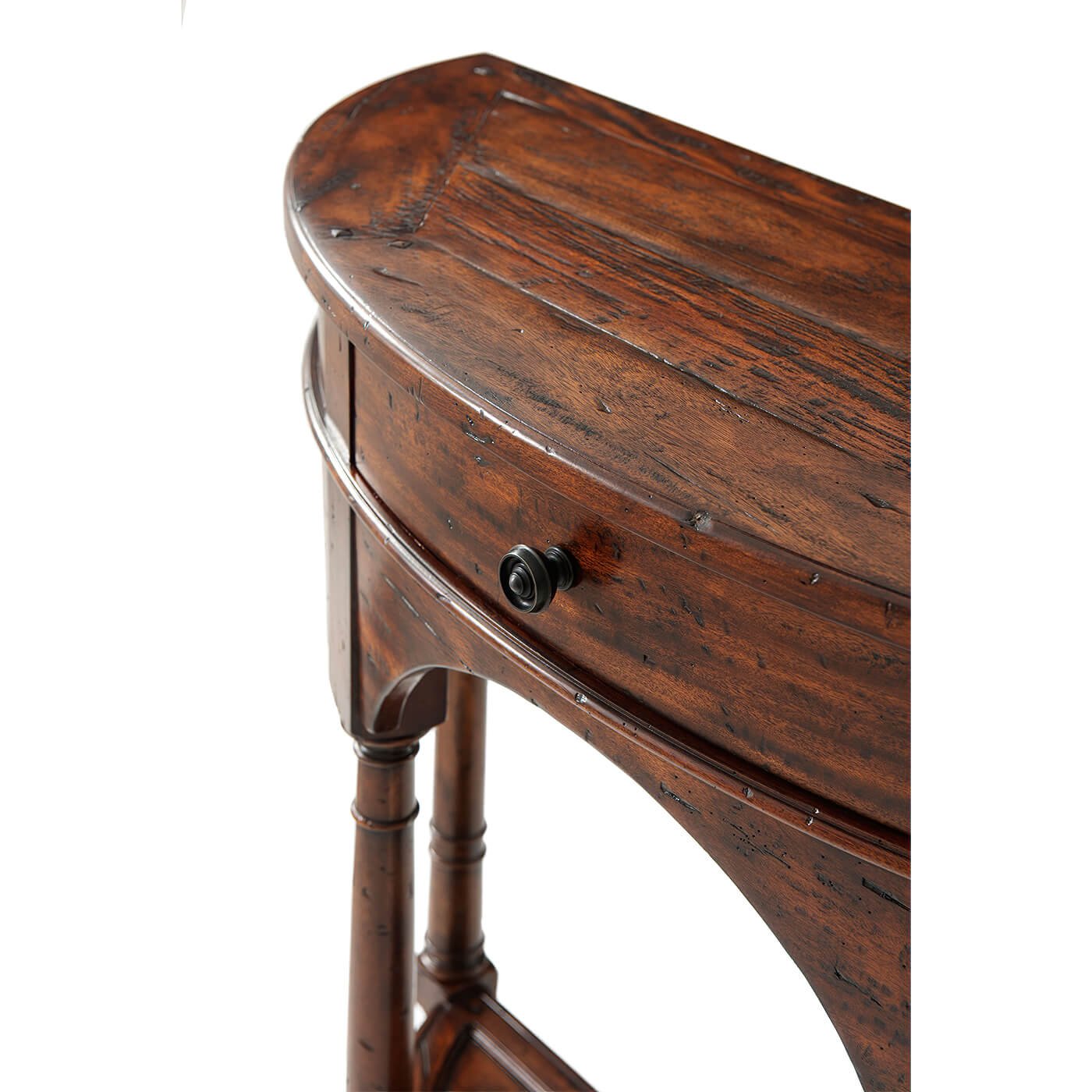 Close-up of bowfront console table drawer and knob.