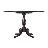 Side view of Italian Provincial dining table pedestal base.