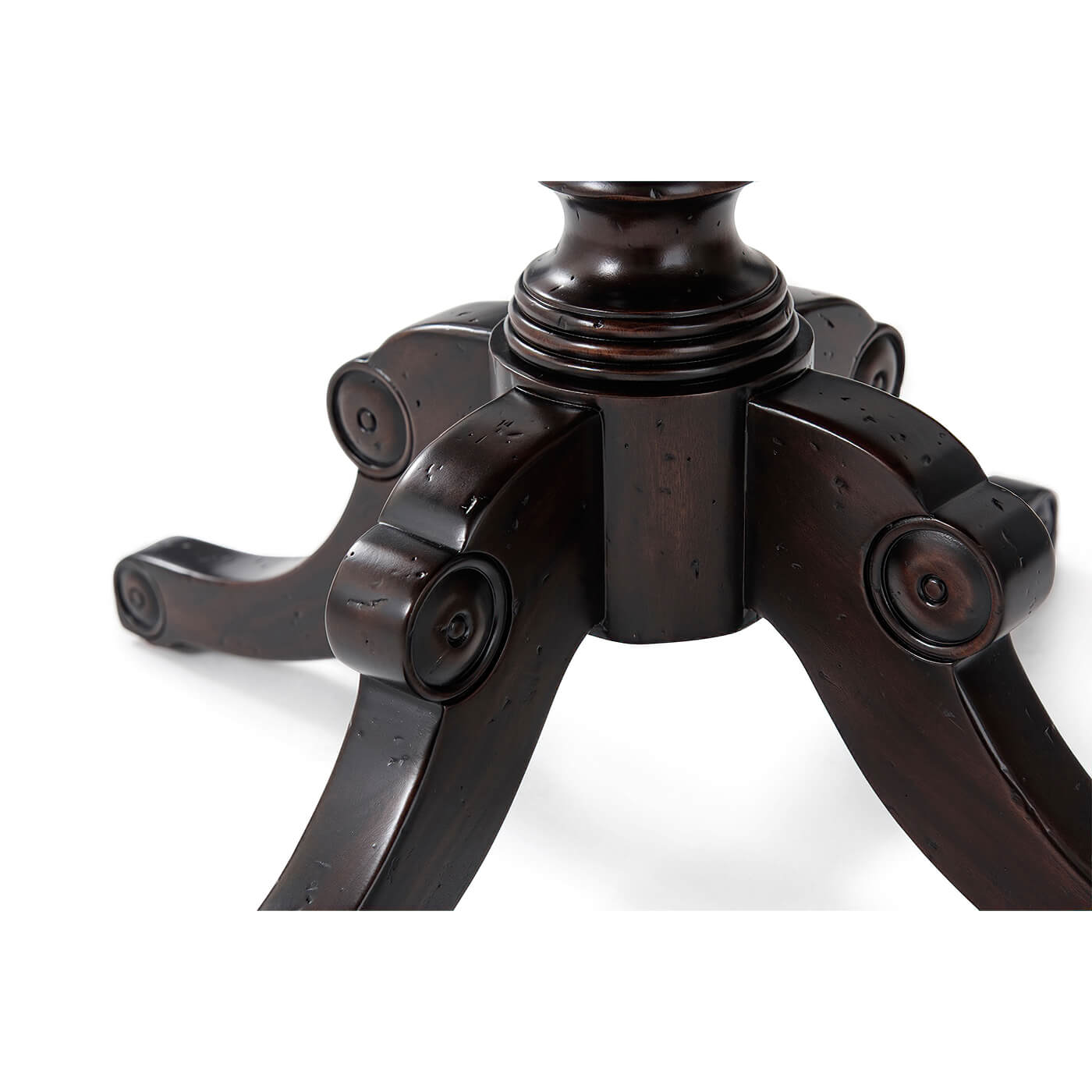 Detail of Italian Provincial dining table carved legs.