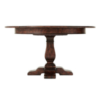Side view of dining table with curved pedestal base.