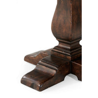 Close-up of pedestal base design on dining table.