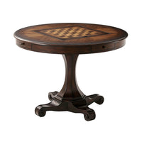Round game table with chessboard top view.