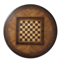Round wooden game table with chessboard pattern.