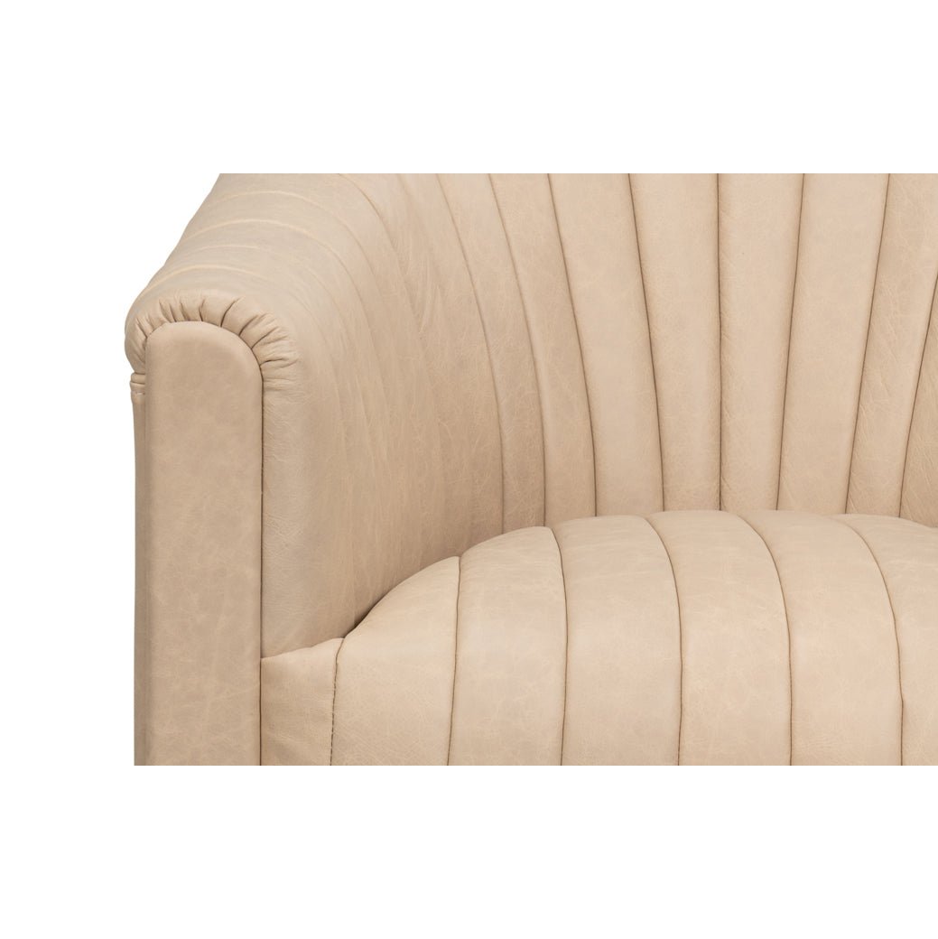 Close-up arm and seat detail, ivory channel tufted chair