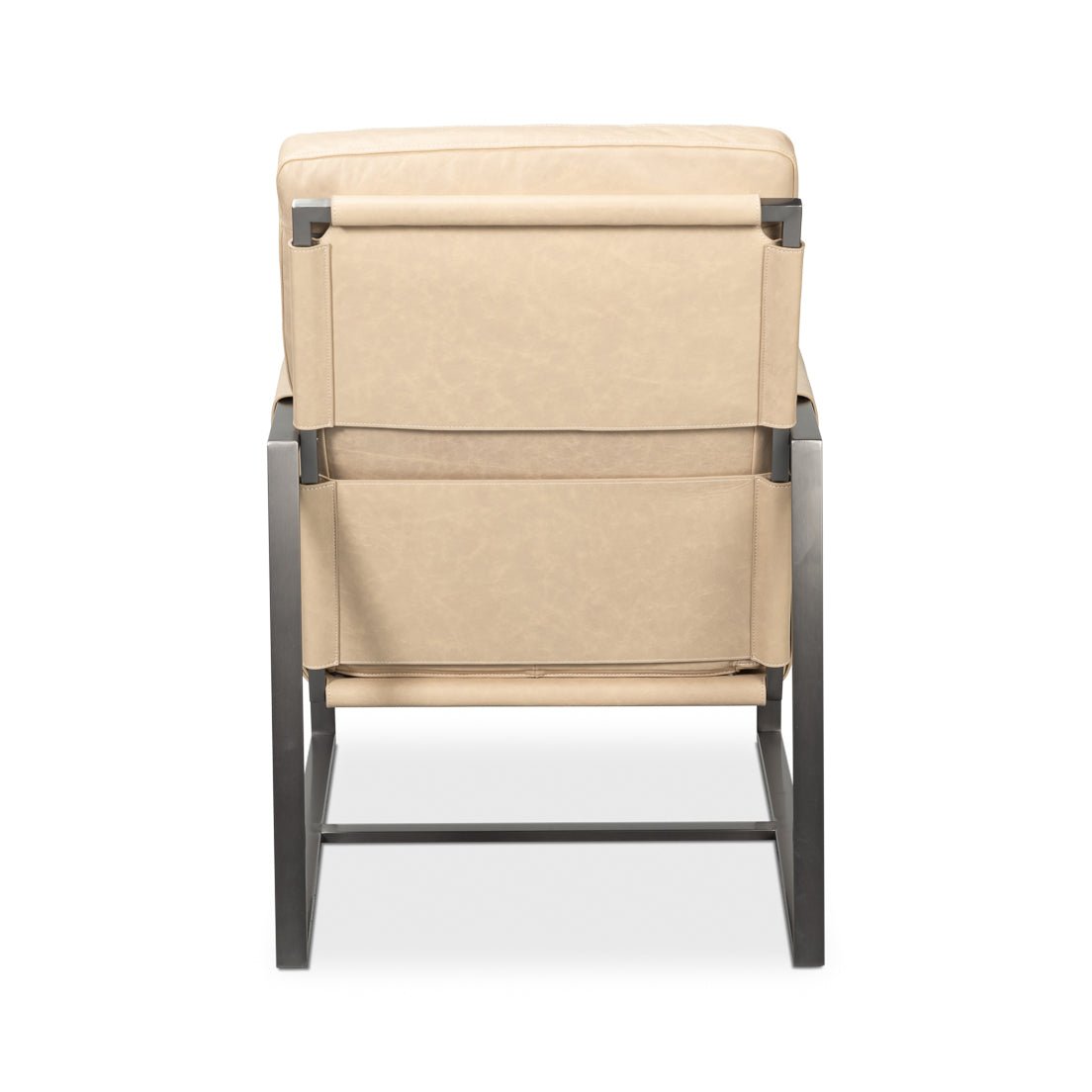 Rear view of ivory leather accent chair.