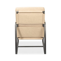 Rear view of ivory leather accent chair.