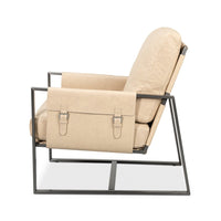 Side profile of ivory leather accent chair.