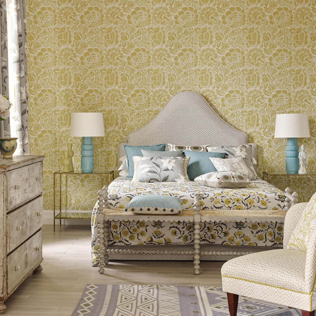 Bedroom decor featuring Jacobean style grey painted bench.