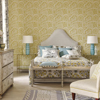 Bedroom decor featuring Jacobean style grey painted bench.