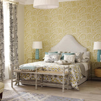 Styled bedroom with Jacobean style grey painted bench front.