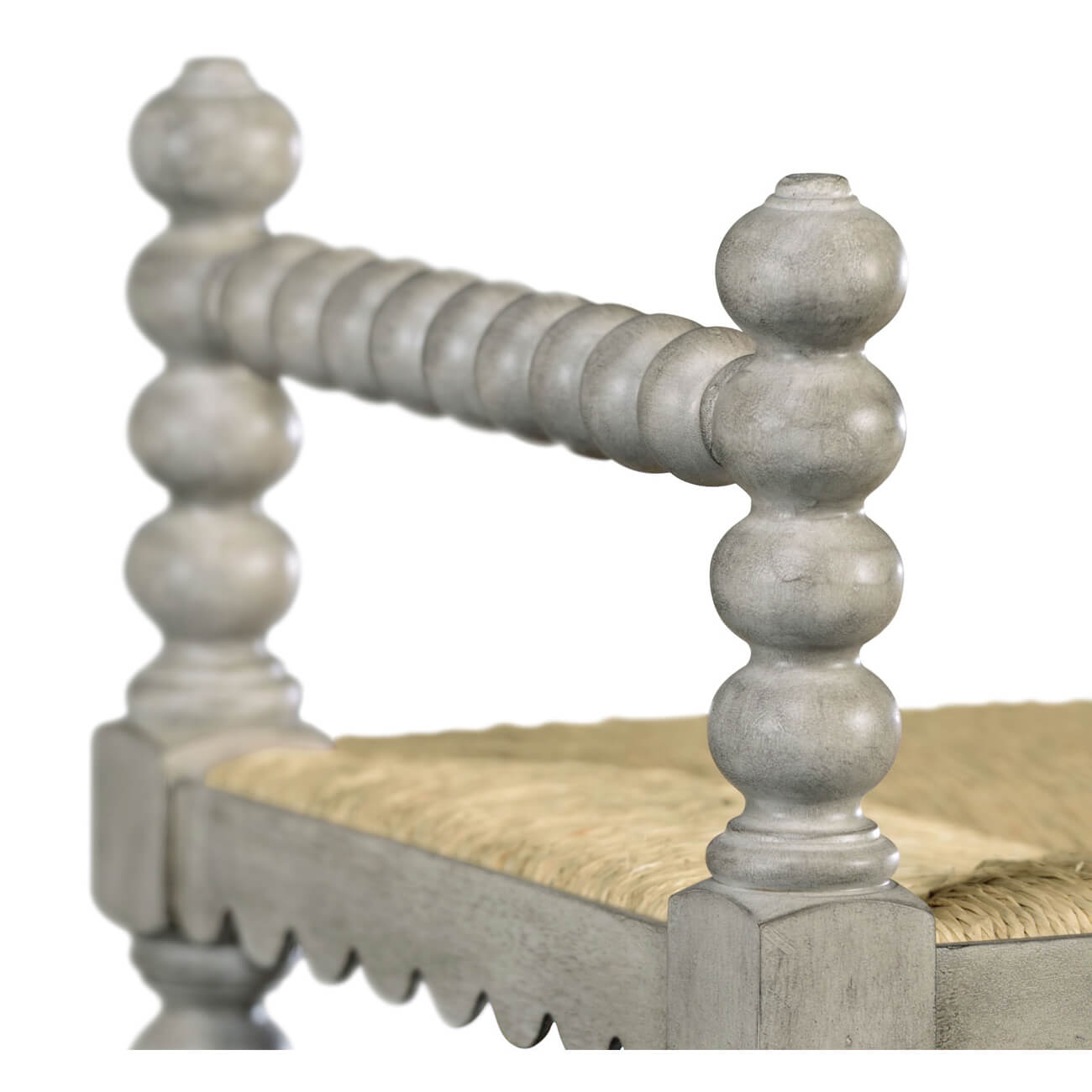 Close-up of arm detail on Jacobean style bench.