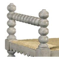 Close-up of arm detail on Jacobean style bench.