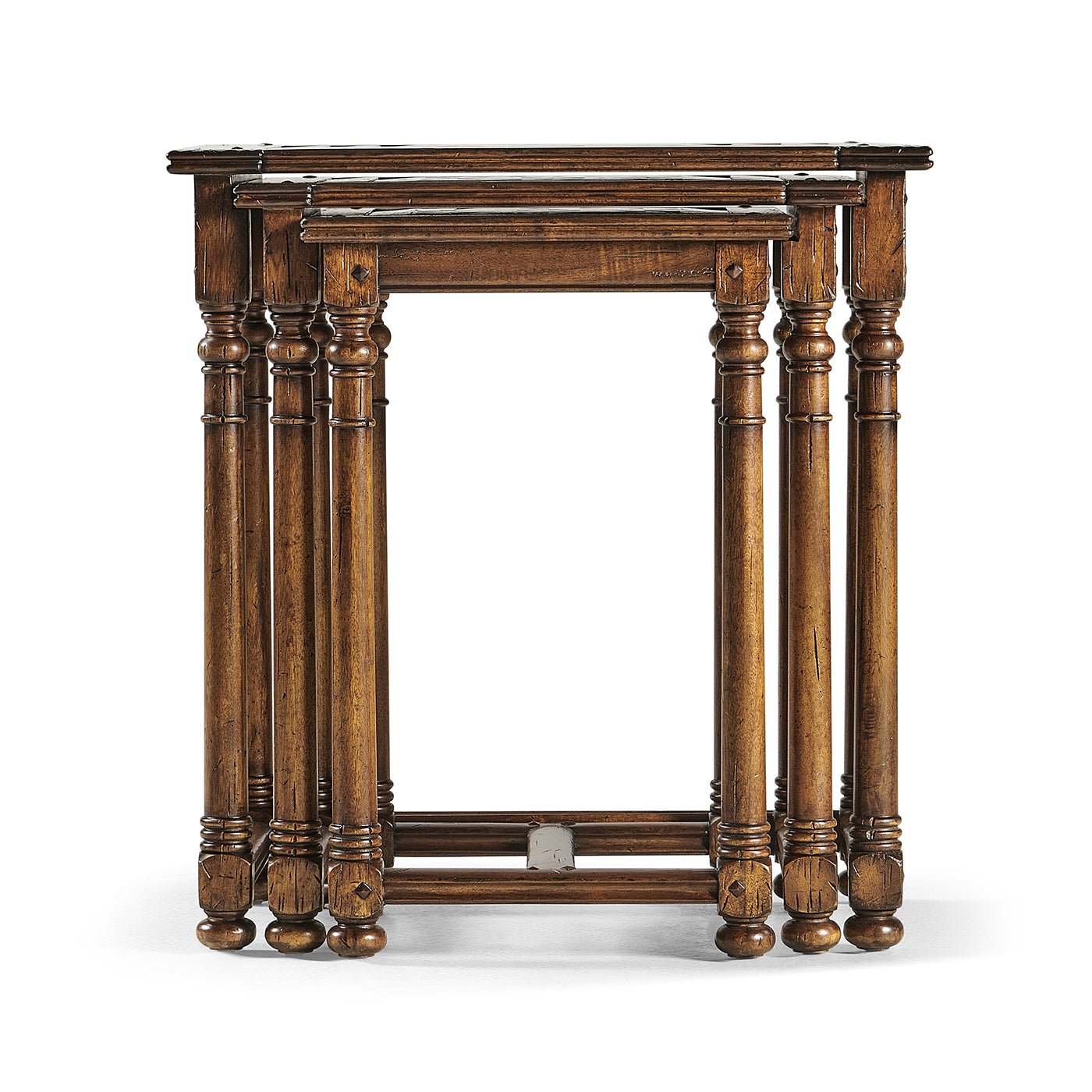 Front perspective of stacked Jacobean style tables.