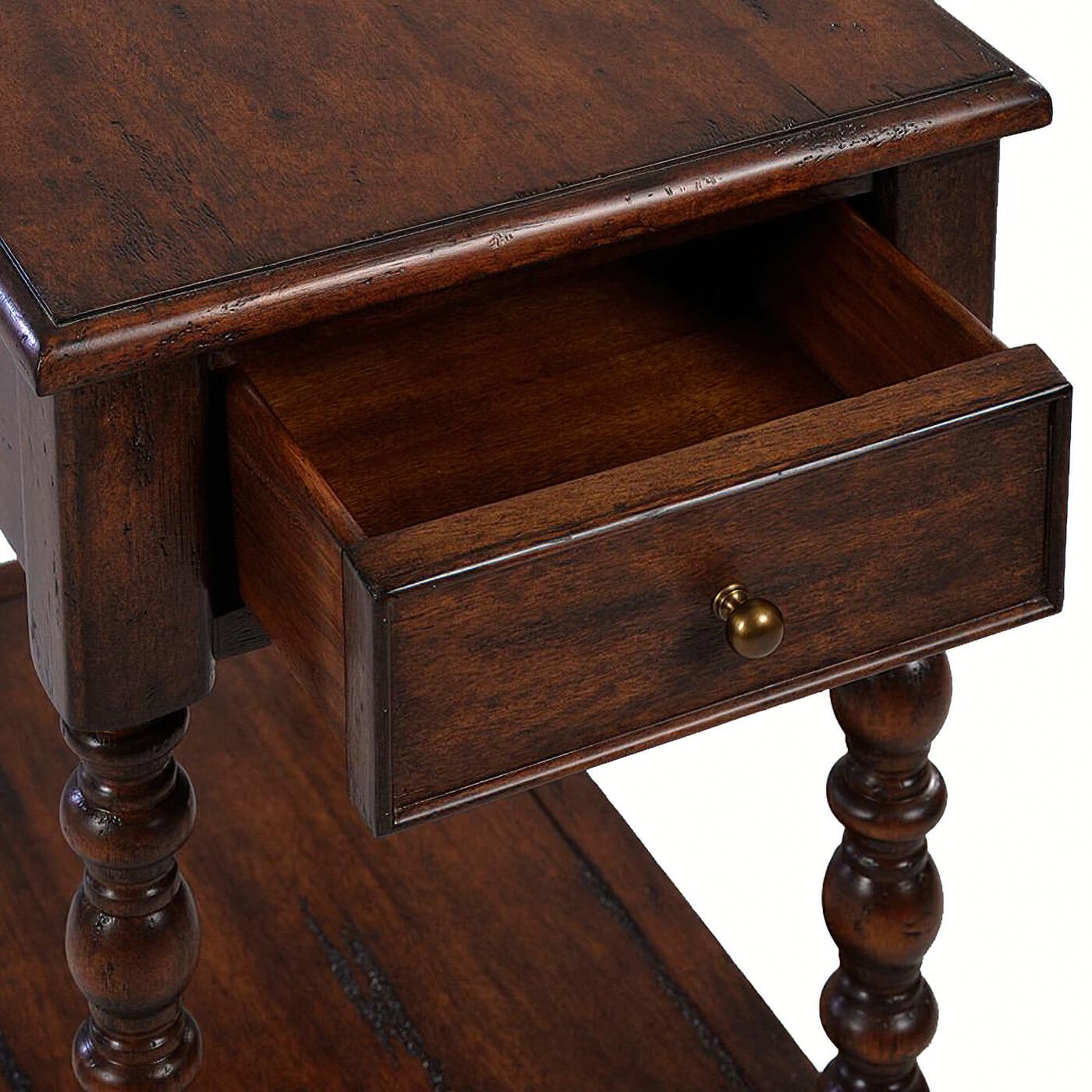 Drawer detail on Jacobean style side table, brown finish.