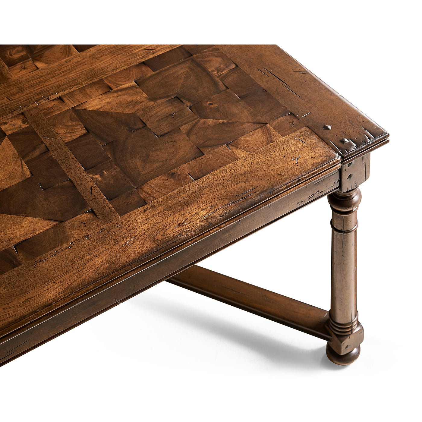Corner detail of Jacobean walnut coffee table top and leg.