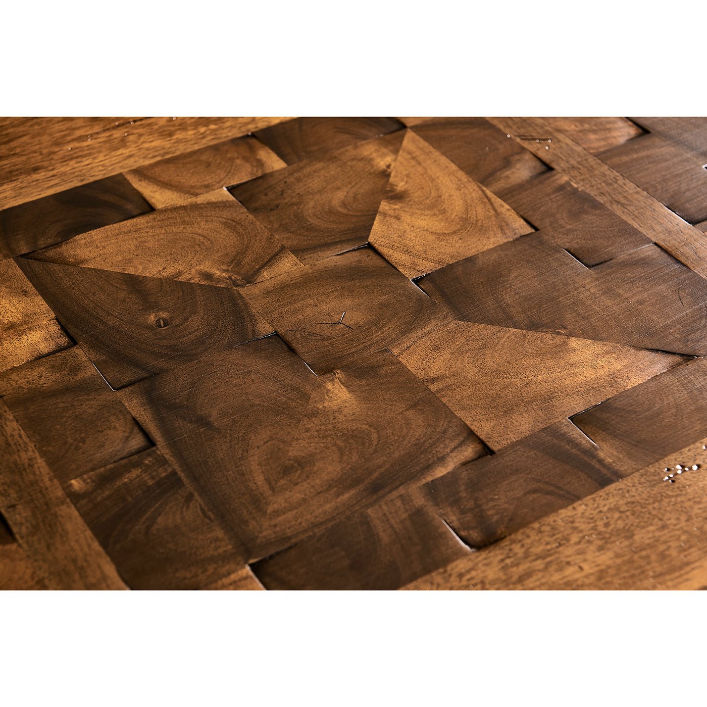 Close-up of walnut wood pattern on table surface.