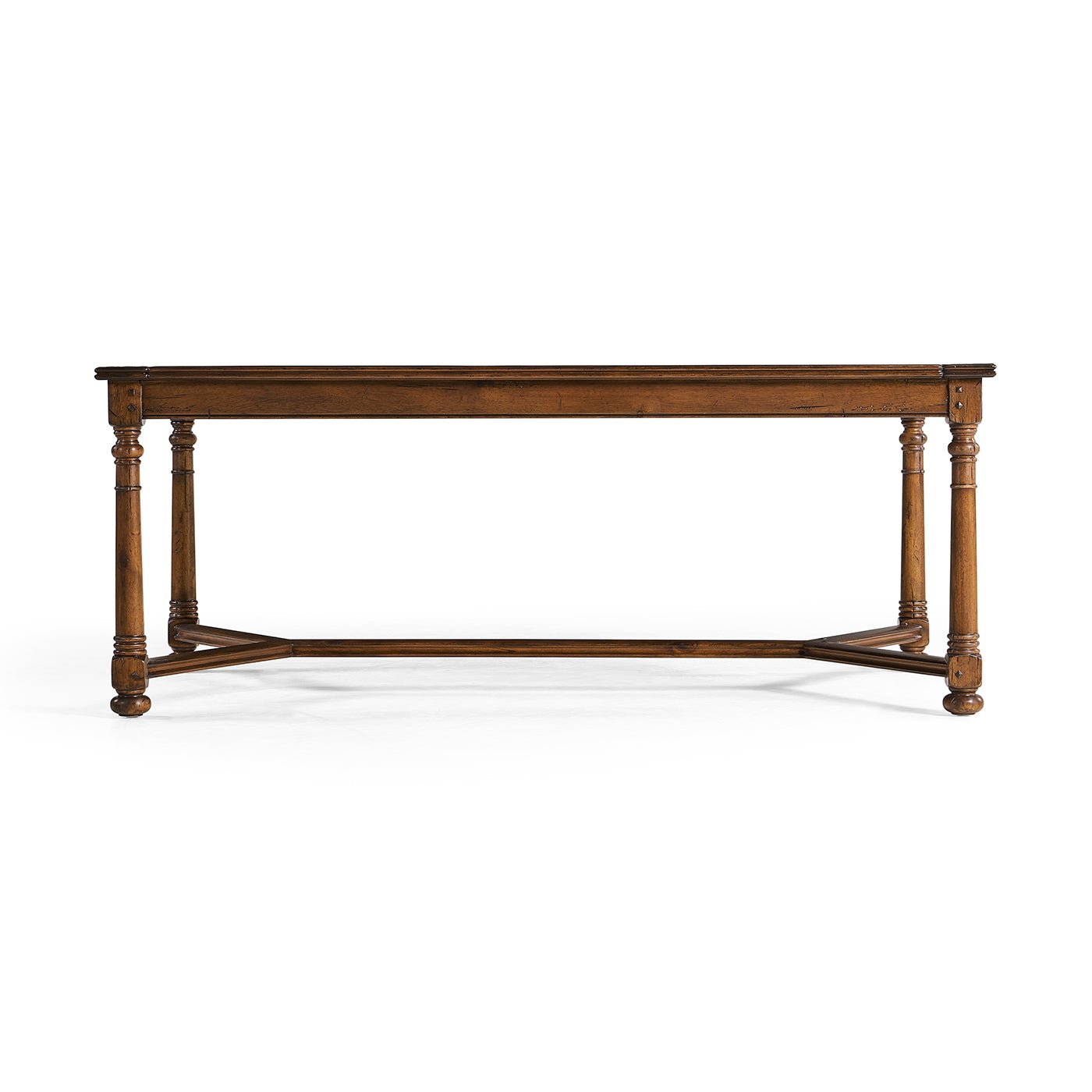 Long side view of Jacobean walnut coffee table.