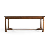 Long side view of Jacobean walnut coffee table.