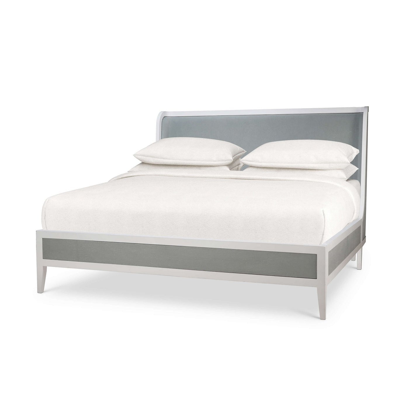 Angled view of king upholstered bed with linen wrap.