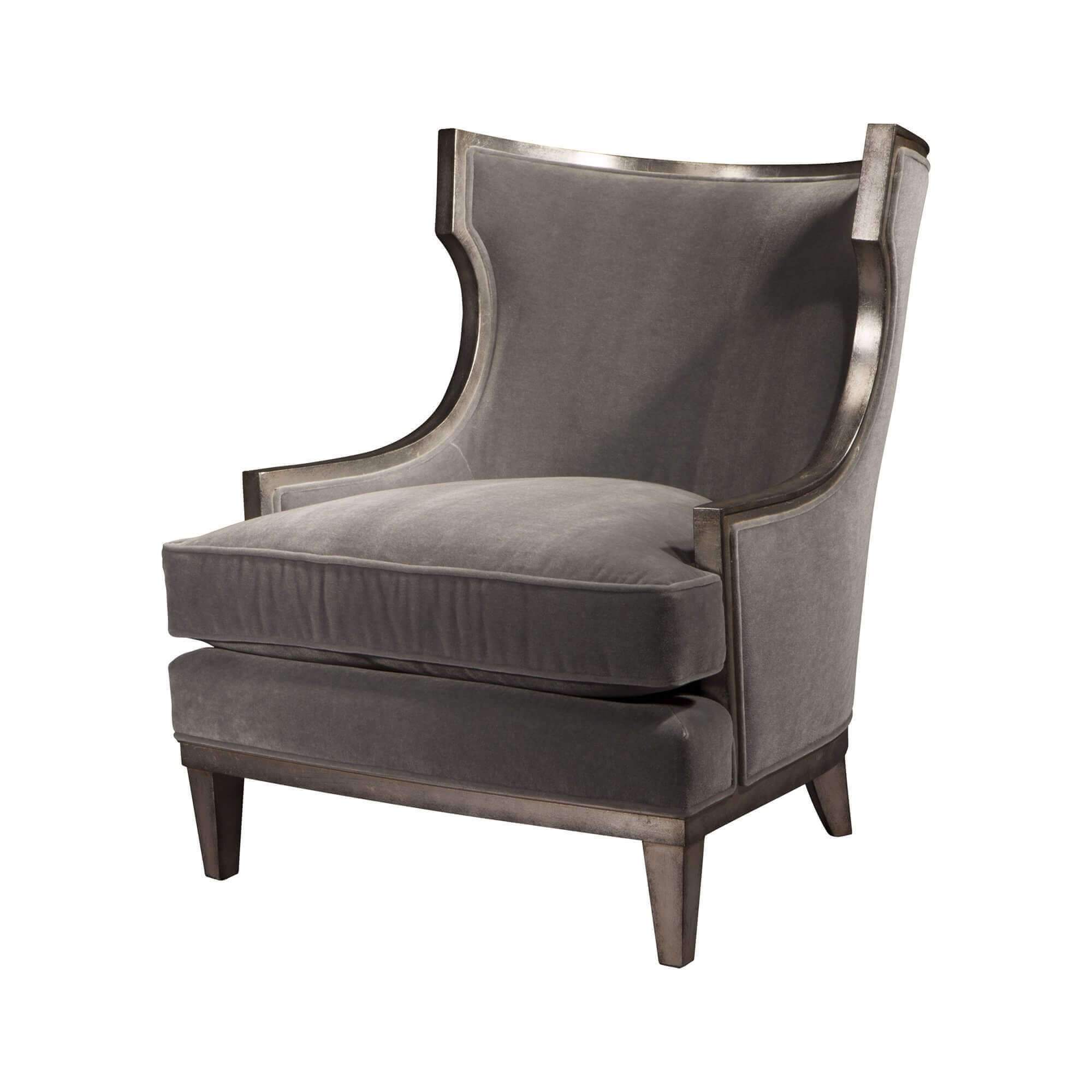 Gray Klismos wingchair, angled view, elegant design.