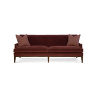 Mid-century sofa, front view with pillows.