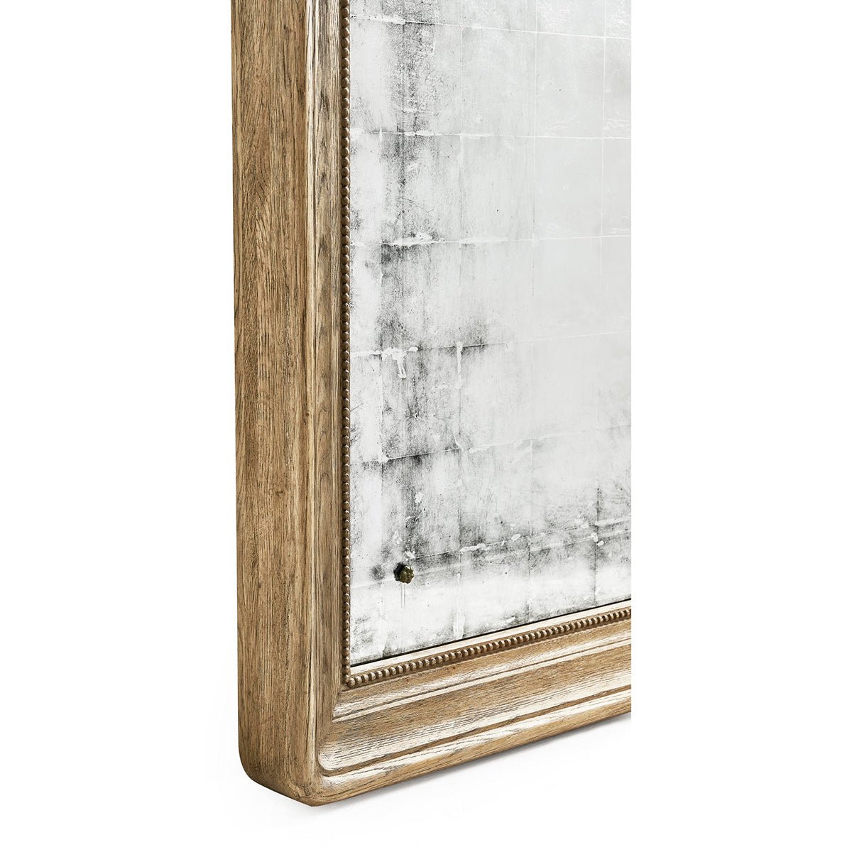 Side view of antique mirror showing wood texture.