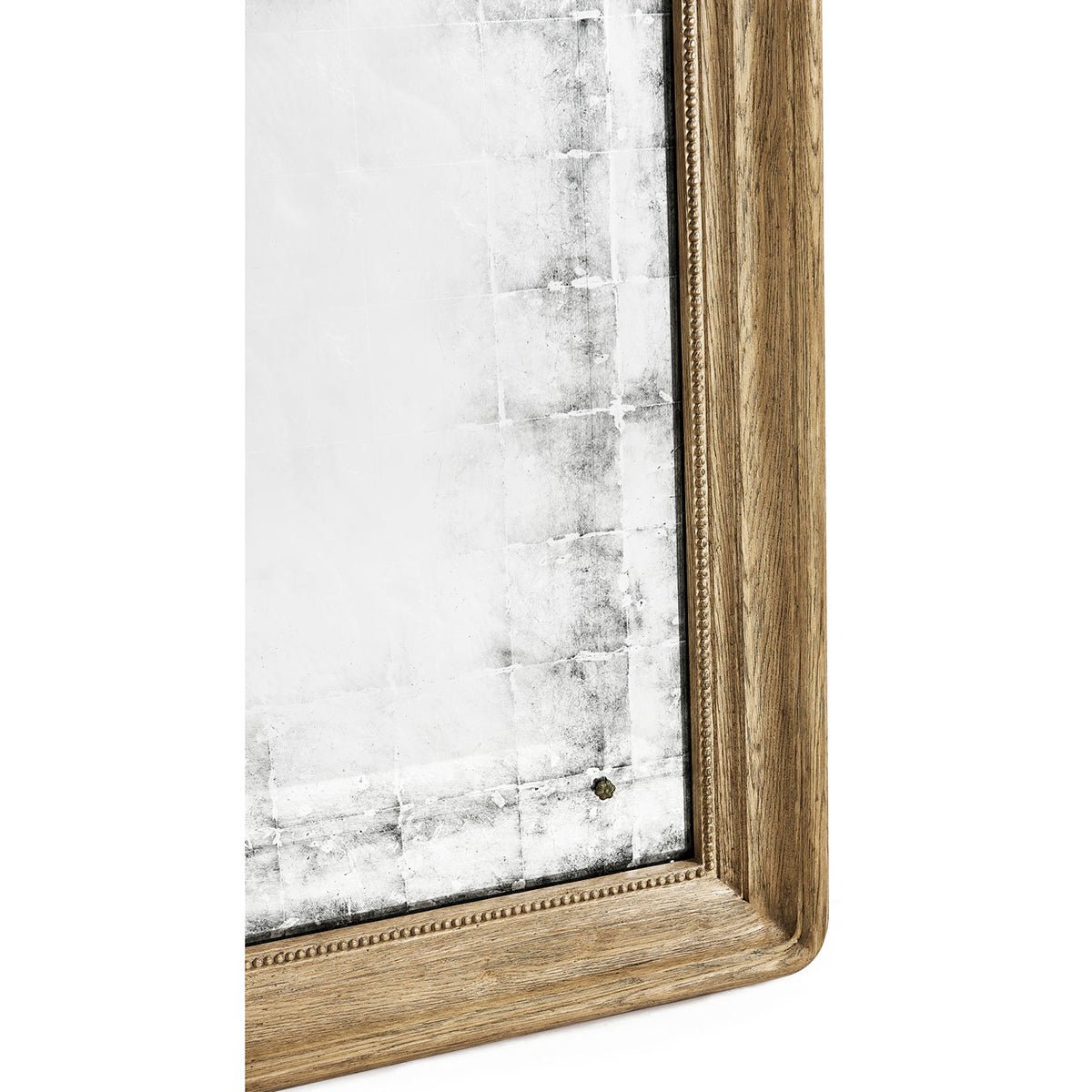 Detail of mirror corner with wooden frame and texture.
