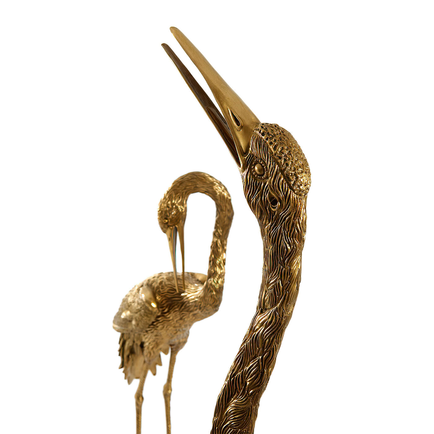 Close-up of crane heads, intricate detail.