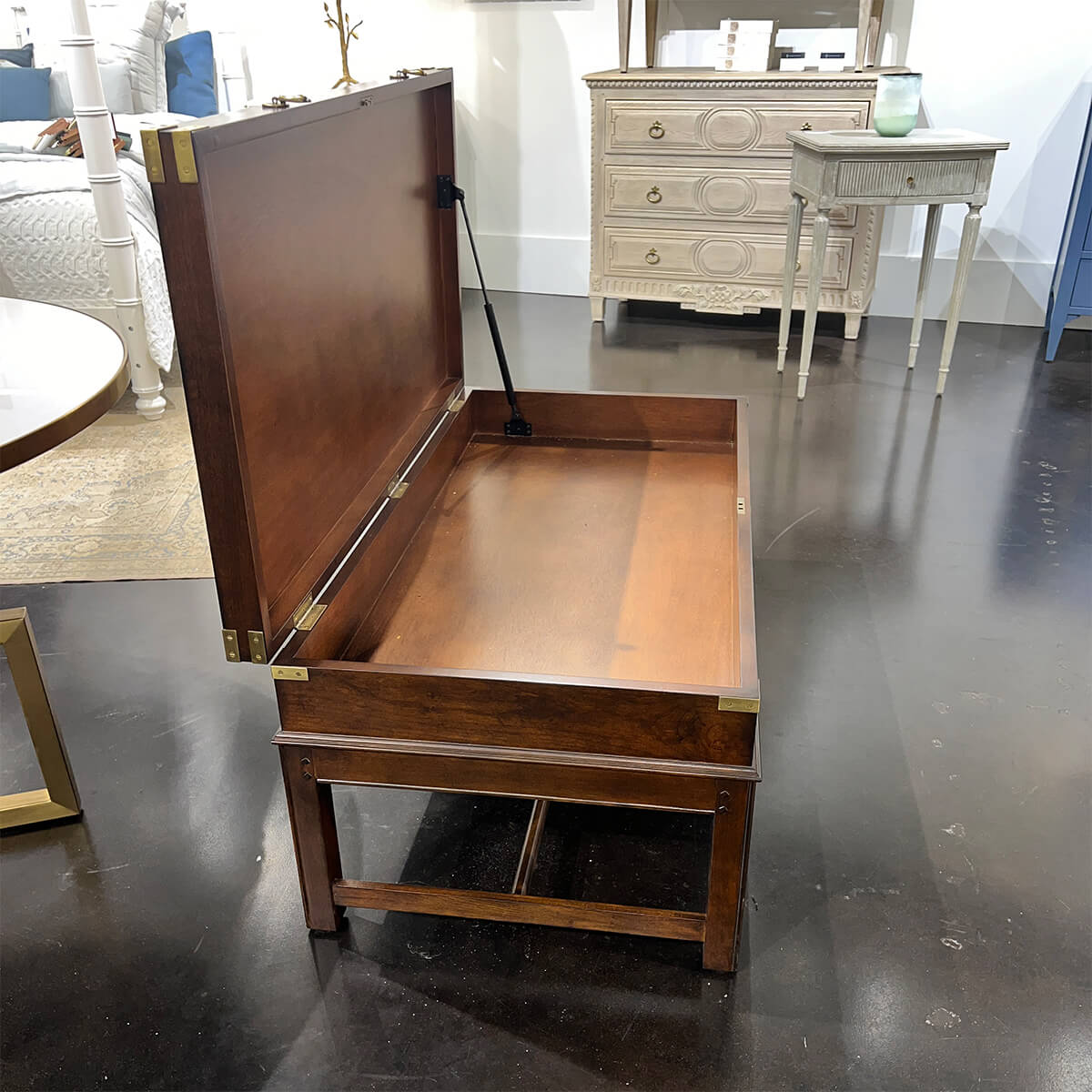 Open wooden coffee table showing interior, perspective view.