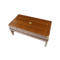 Top view of closed wooden coffee table with details.
