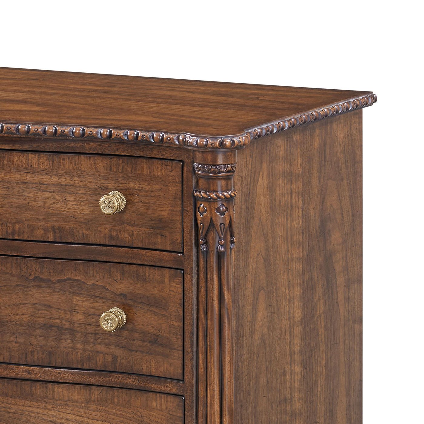 Close-up of nightstand corner detailing and ornate design.