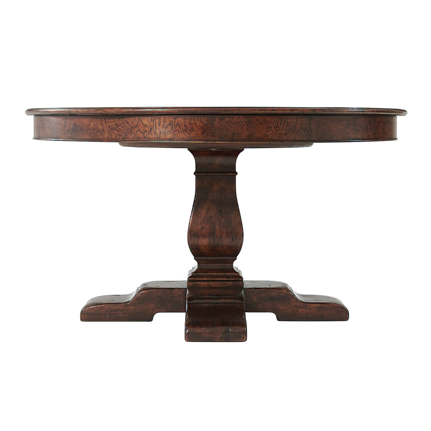 Side profile of round dining table, wooden pedestal.