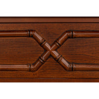Close-up of bamboo detailing on faux bamboo dresser drawer.