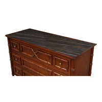 Top view of faux bamboo dresser, showcasing marble top.