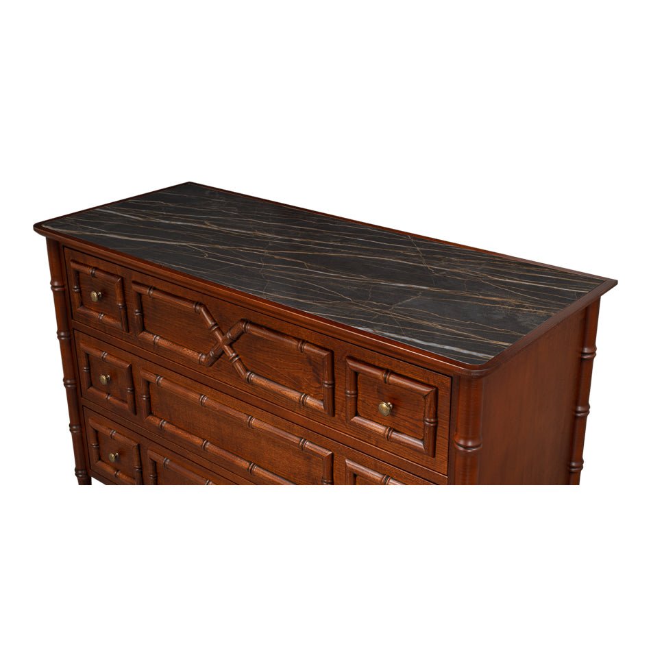 Top view of faux bamboo dresser, showcasing marble top.