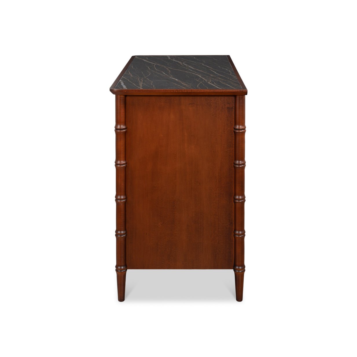 Side view of faux bamboo dresser with marble top.